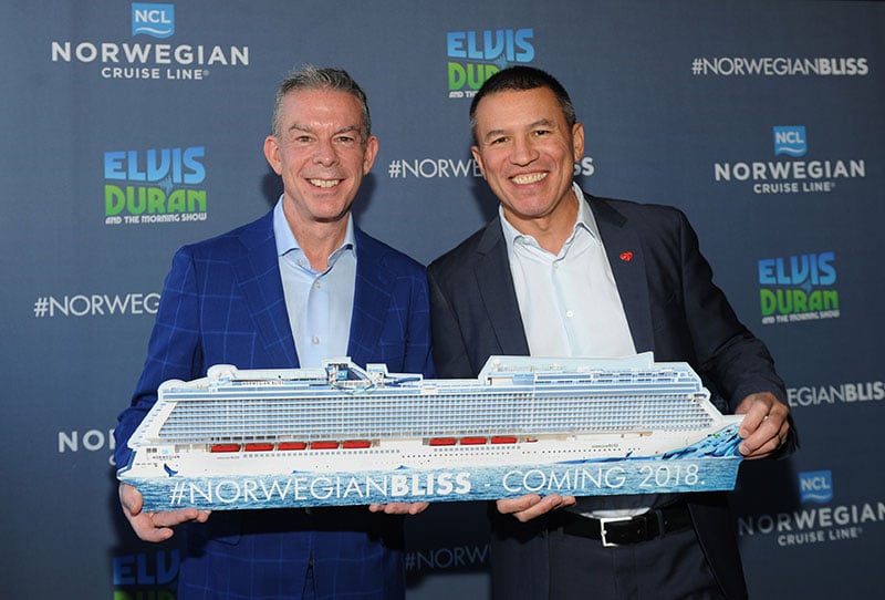 Radio personality Elvis Duran left and Norwegian Cruise Line President and COO Andy Stuart with a model of the Norwegian B