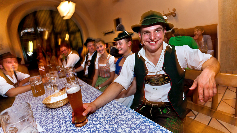 Folks drinking beer in Hofbruhaus Munich Germany