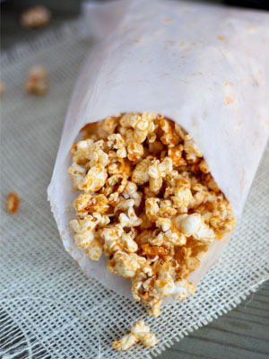 Sriracha Sesame Ginger Popcorn recipe - National Happy Hour Day food and cocktail recipes