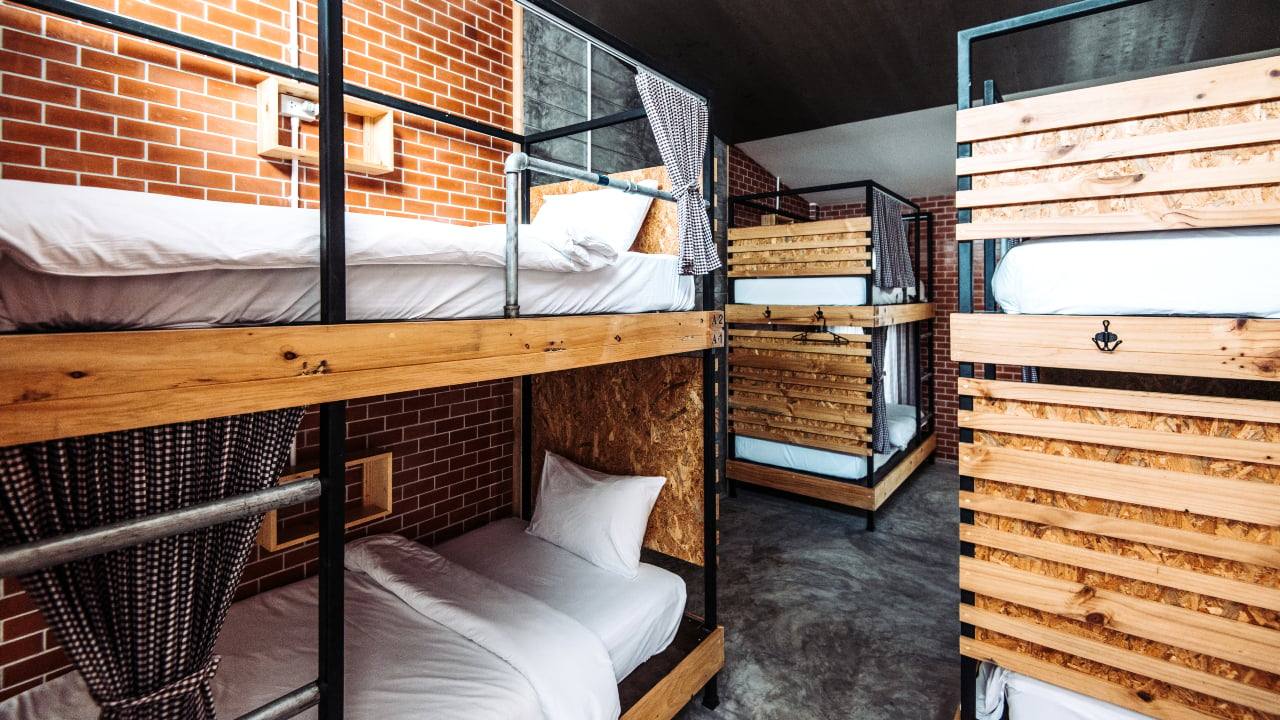 Dormitory room with bunk beds in the modern hostel
