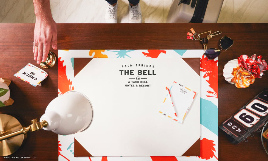 The front desk of The Bell A Taco Bell Hotel and Resort 