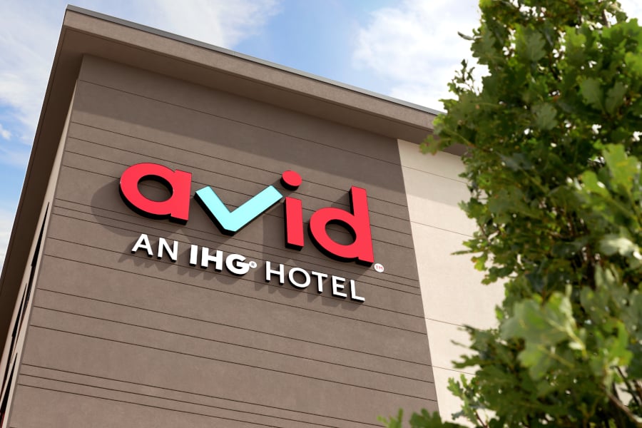 The Avid Hotels logo on the side of the Avid Hotel Oklahoma City  Quail Springs