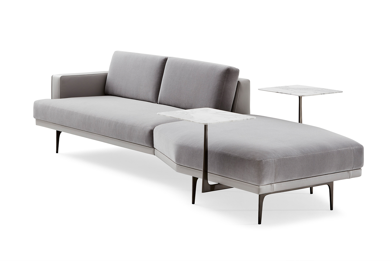 The Lyda sofa designed by Lauren Rottet is upholstered in a warm neutral mohair and gray leather and complemented by steel