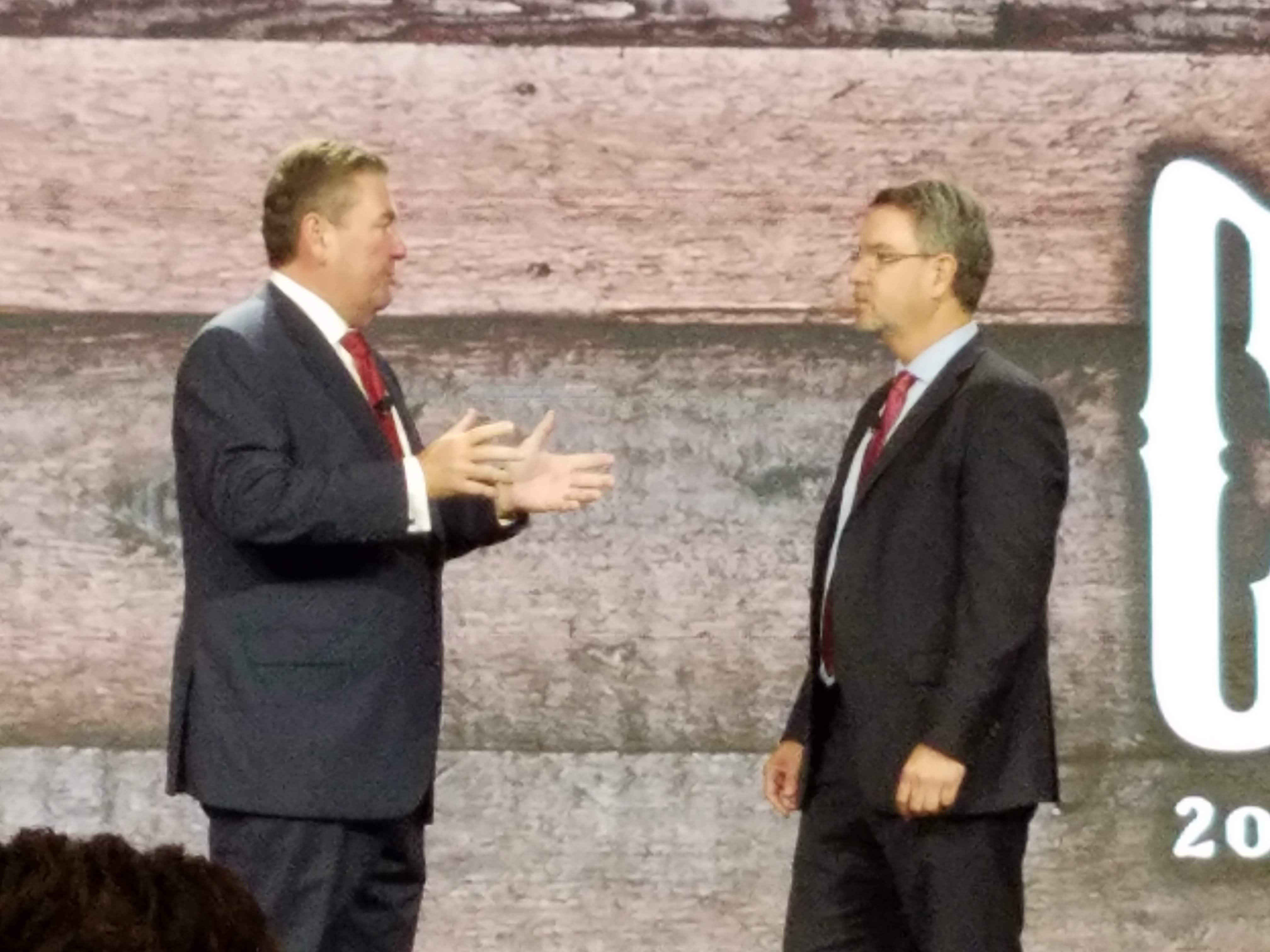 Red Roof Chief Development Officer Phil Hugh and President Andrew Alexander talk on the stage of the Gaylord Opryland