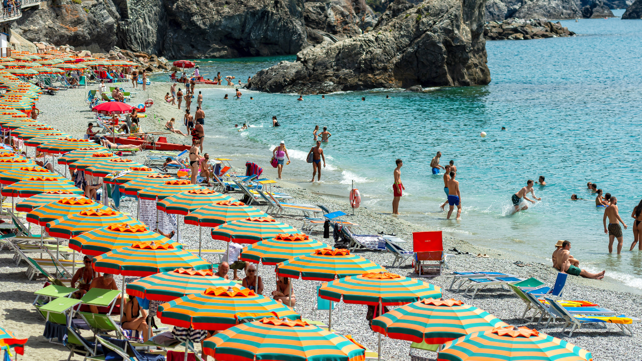 Umbrellas on the beach in Cinque Terre Italy