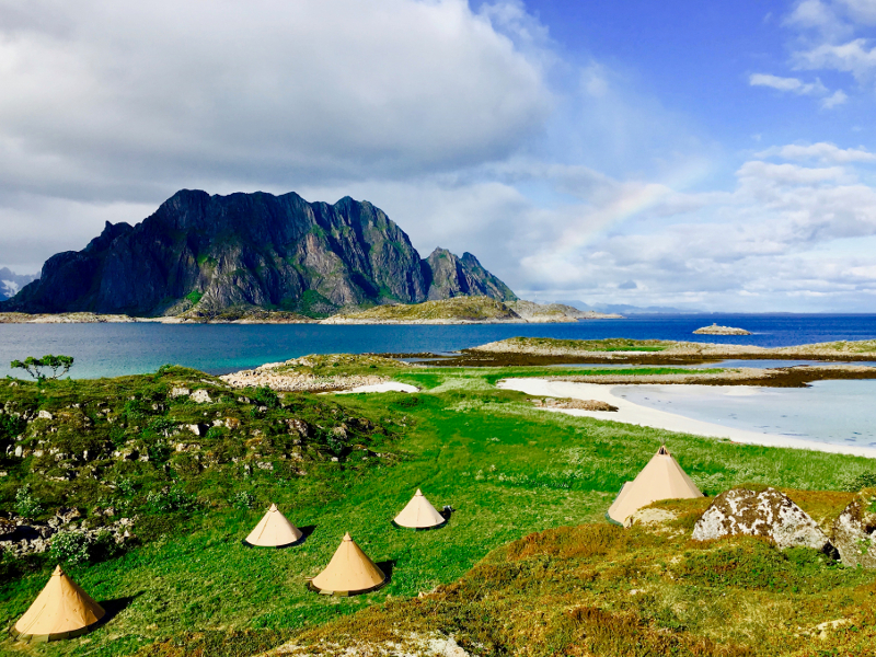 A view of the campsite with the fjord in the background