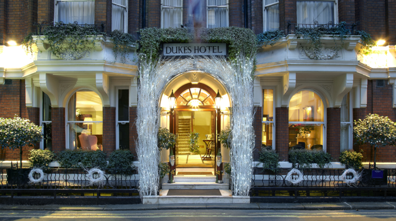 The entrance of Dukes London decorated for Christmas
