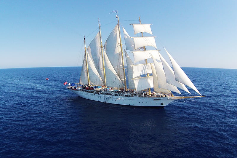 Star Clippers cruise ship in water 