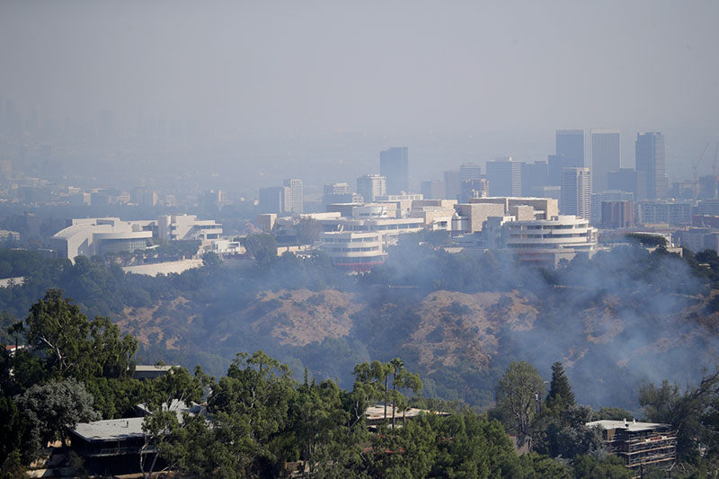 The Getty Center is covered in smoke as the Getty fire burns