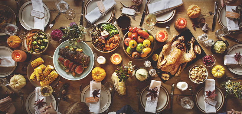 Top down view of a Thanksgiving dinner on a table
