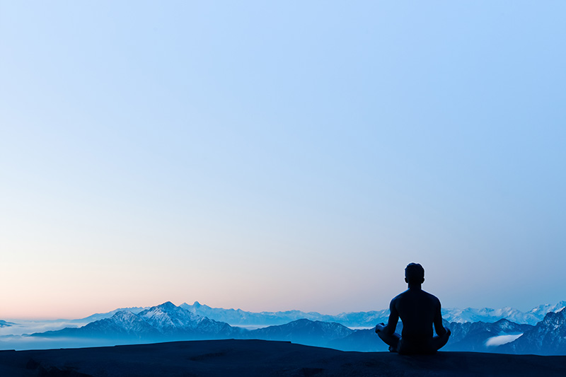 meditating nature wellness mountains