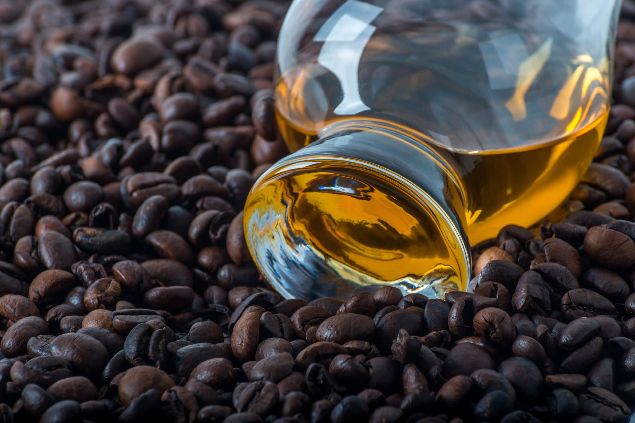 Glencairn whisky glass atop coffee beans