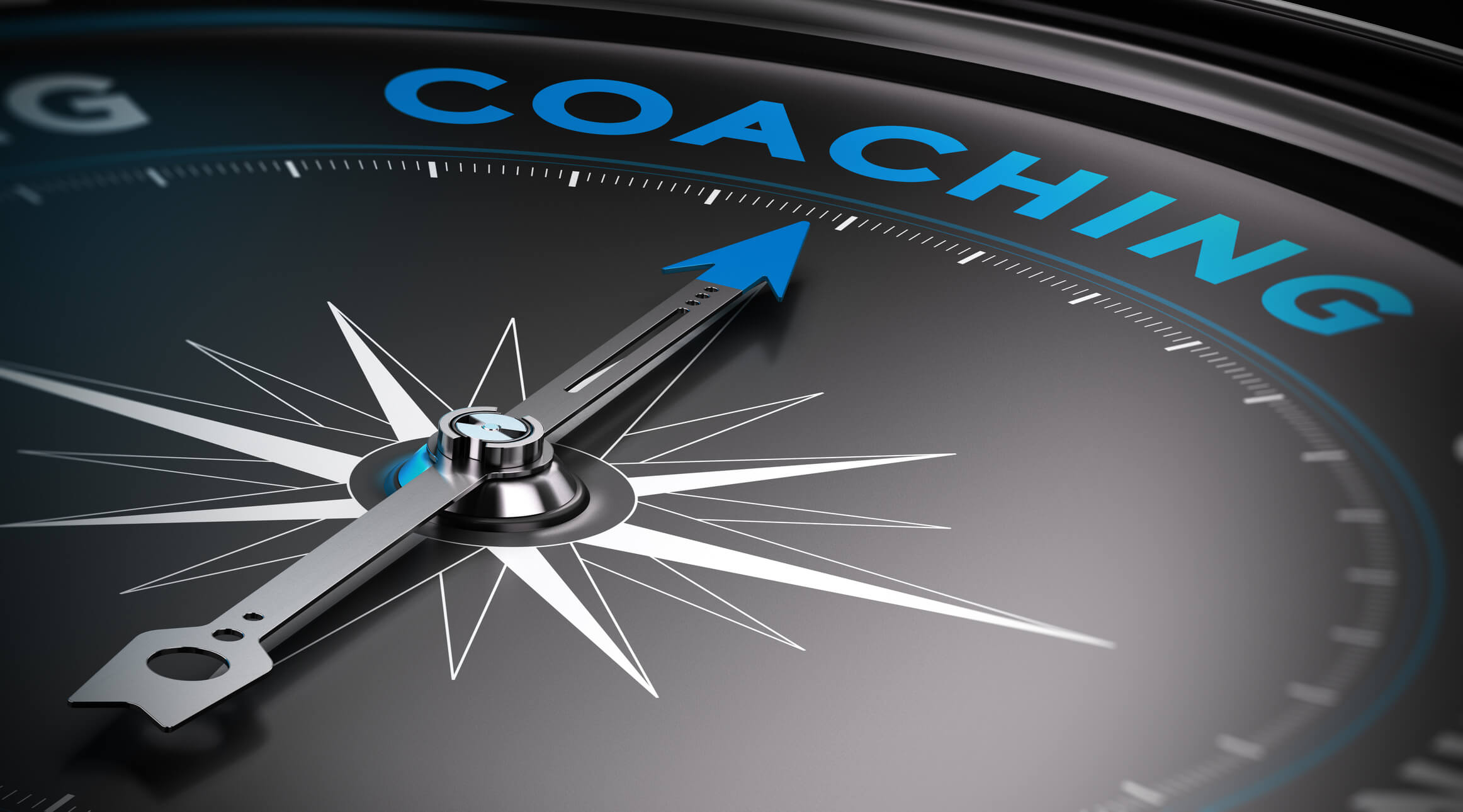 Compass with the word coaching