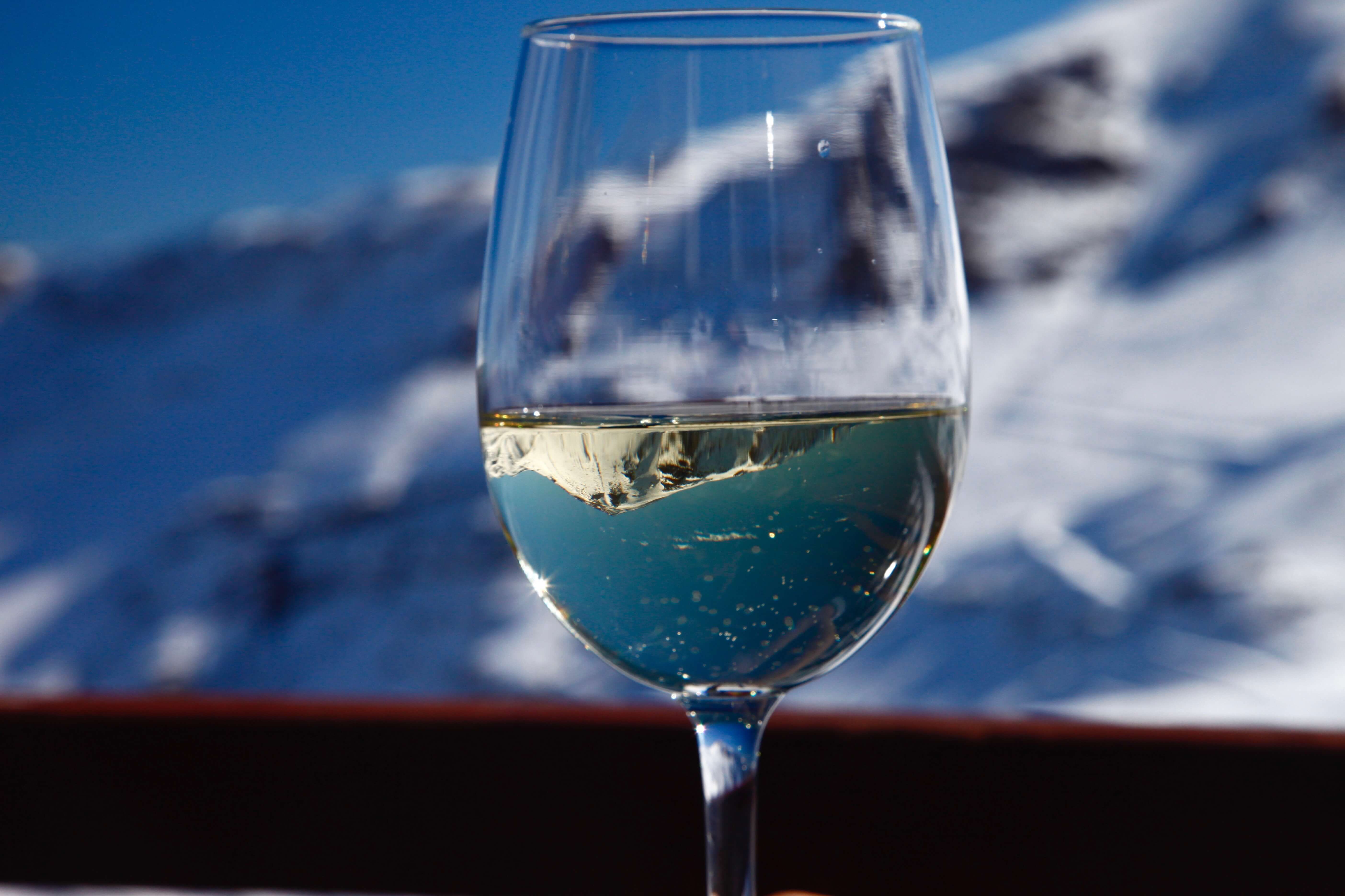 White wine snow and snowy mountain