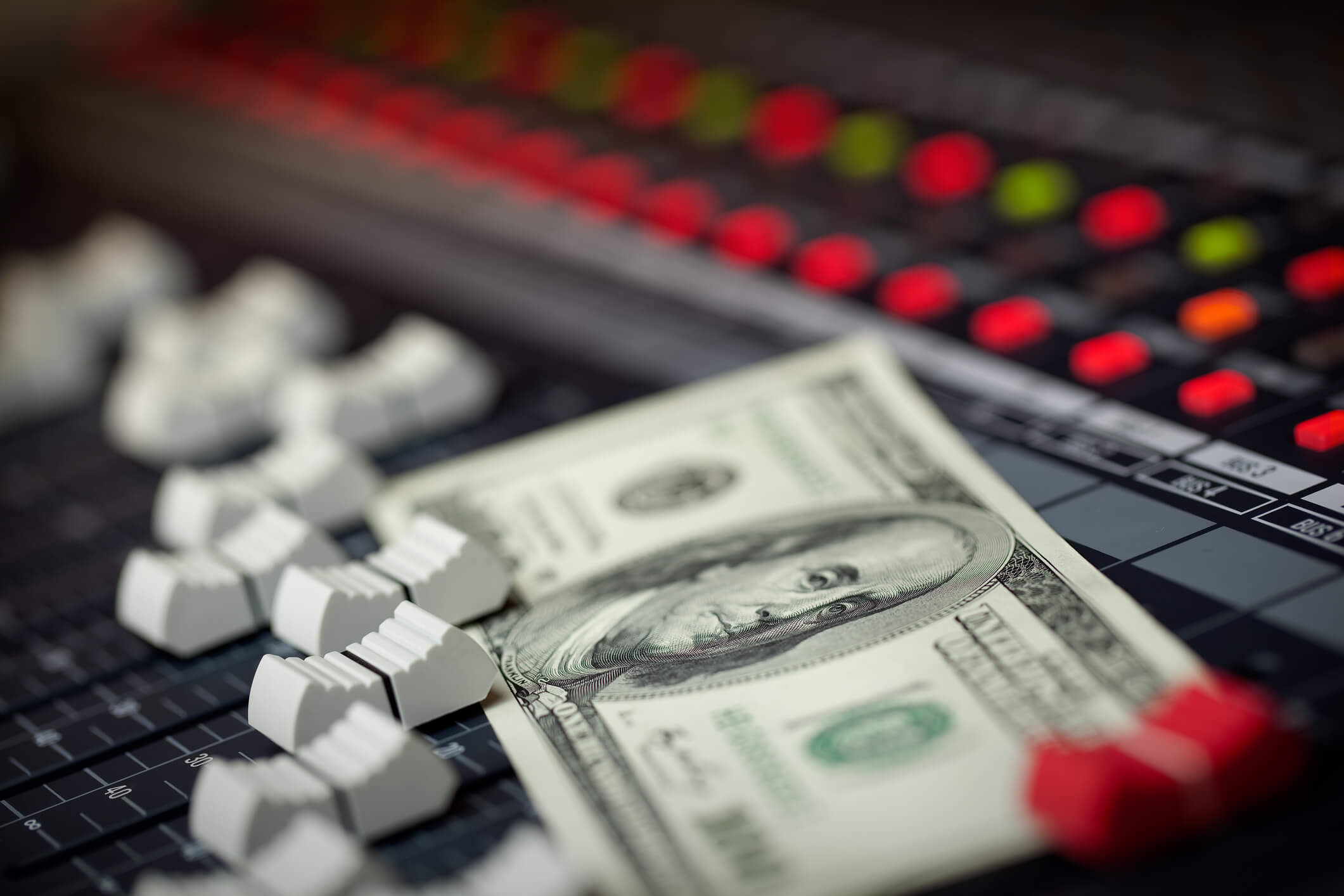 Money on music mixer board