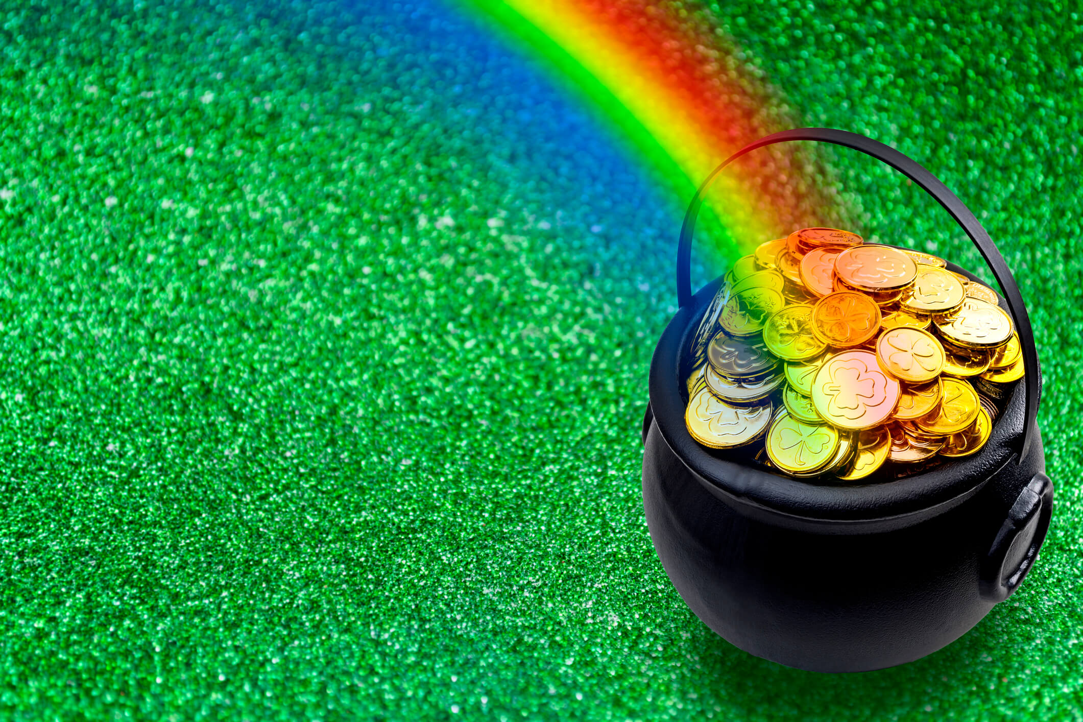 St Patricks Day pot of gold coins with a rainbow