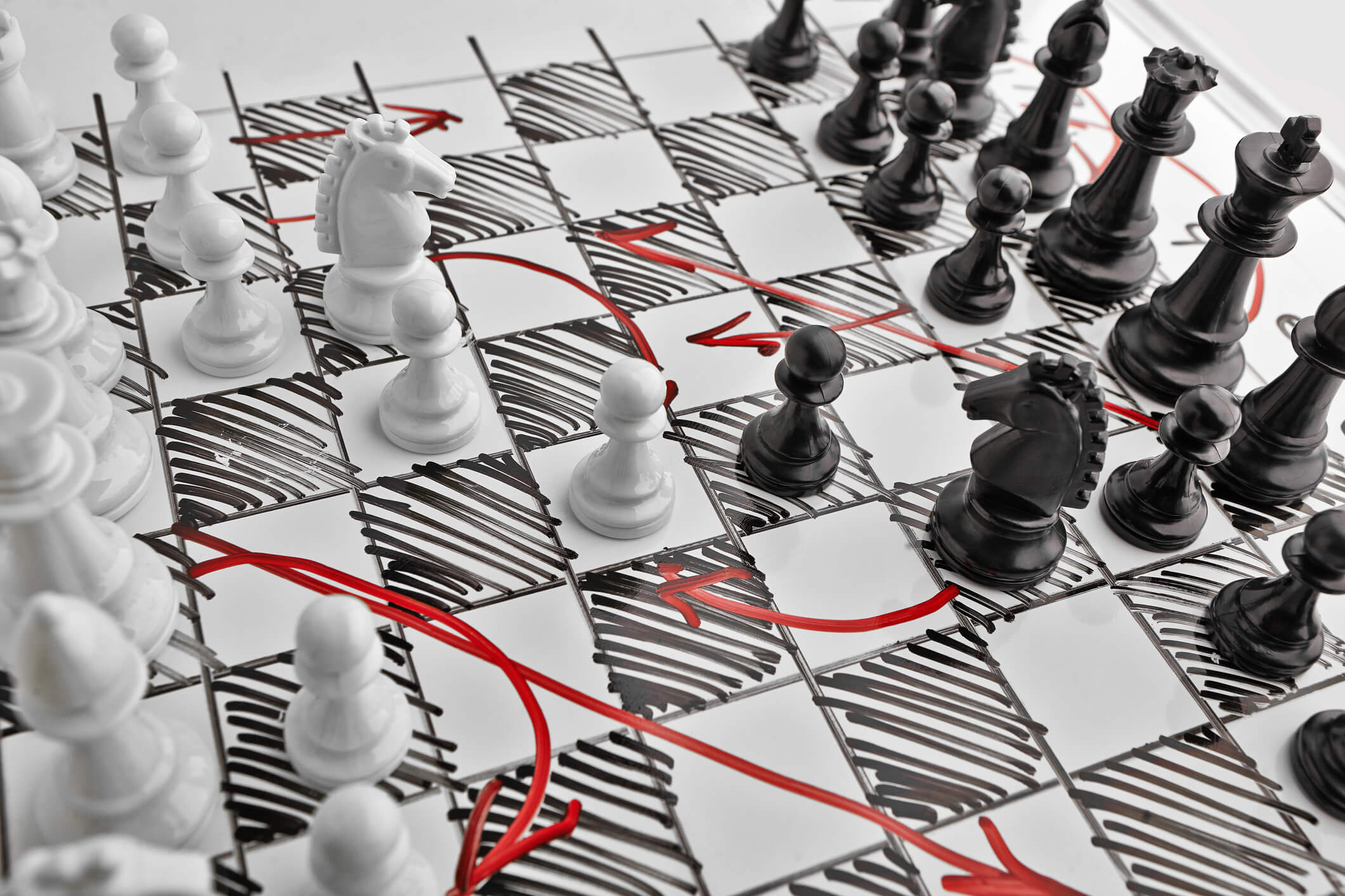 Chessboard with battle plan written on it