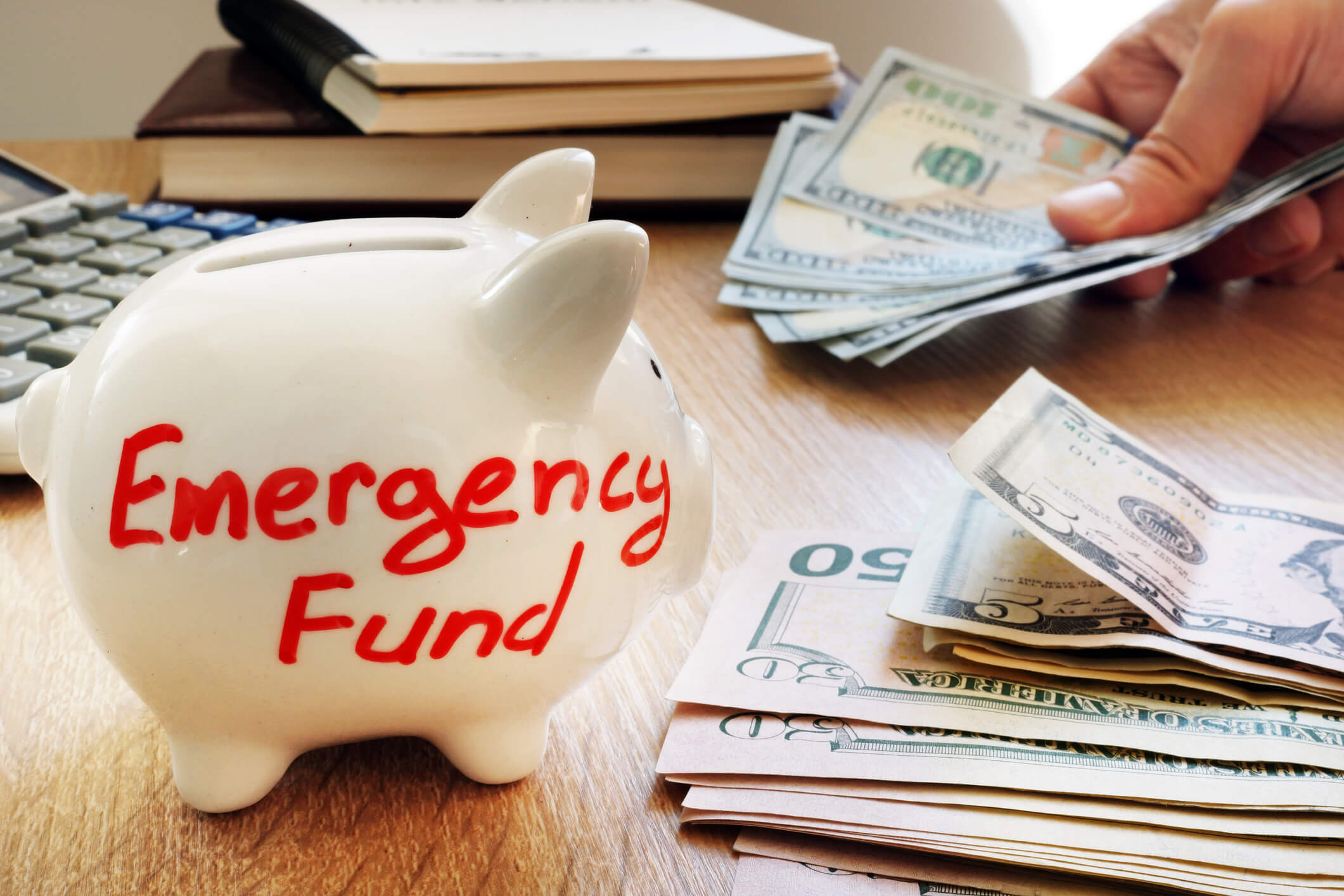 Emergency fund piggy bank and money