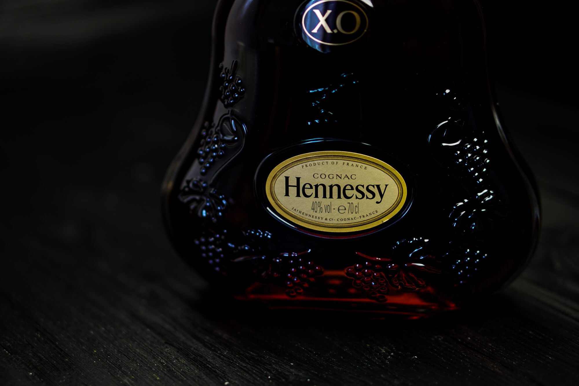Dark image of Hennessy XO bottle