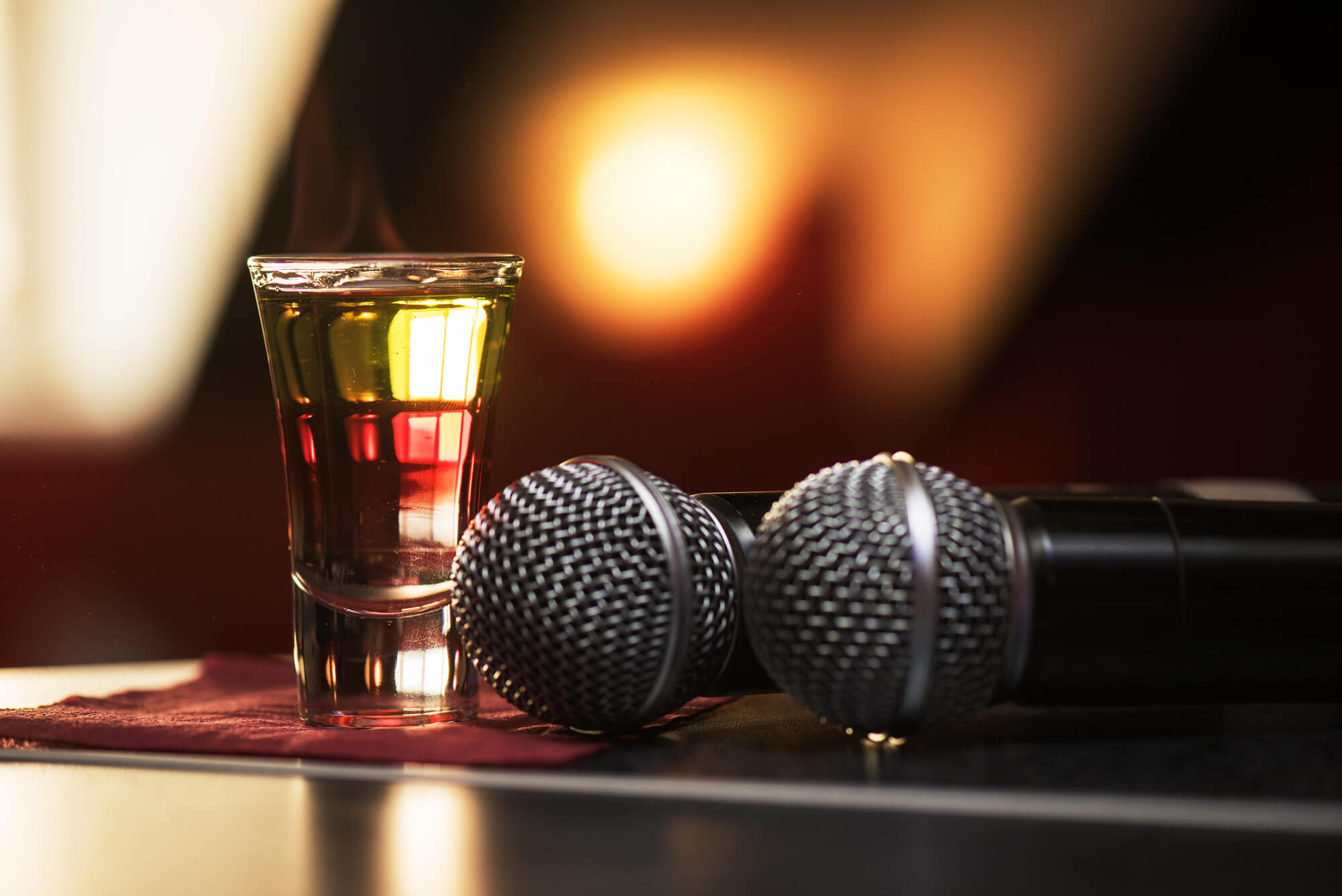 Mics and a shot on a bar