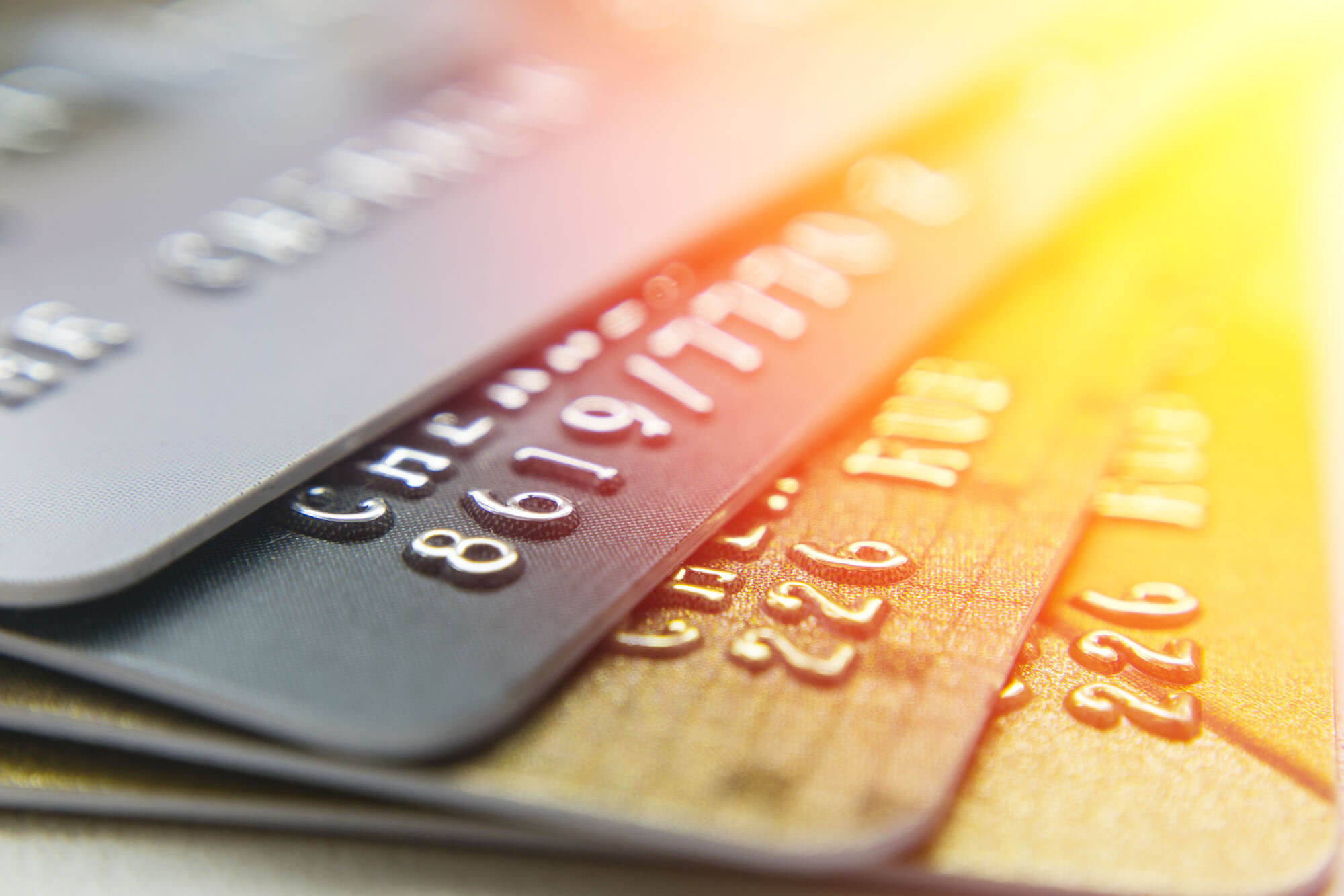 Stack of gold and platinum credit cards