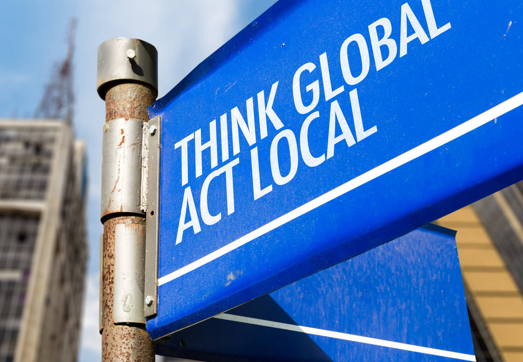Think Global Act Local on street signs
