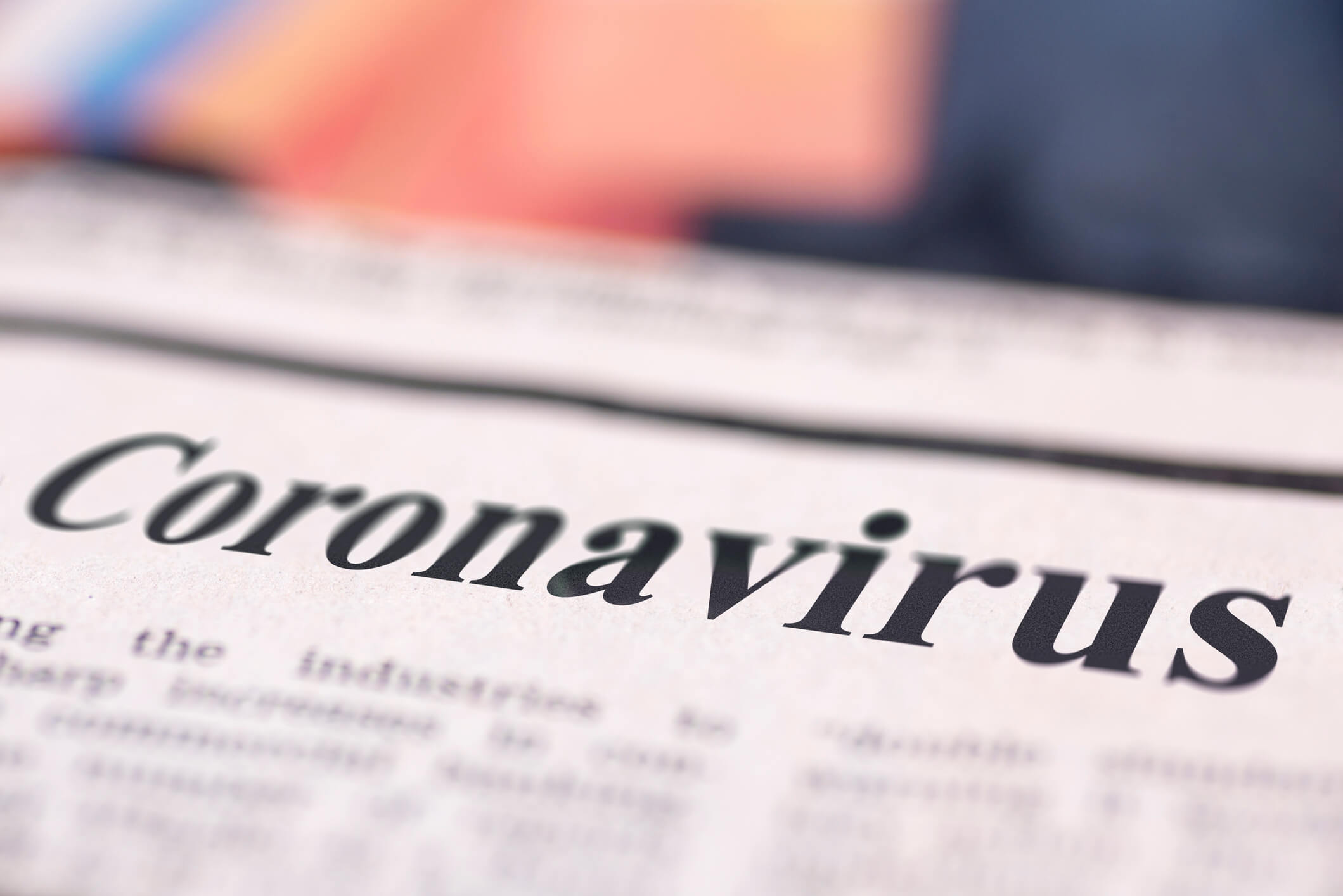 Newspaper with coronavirus headline