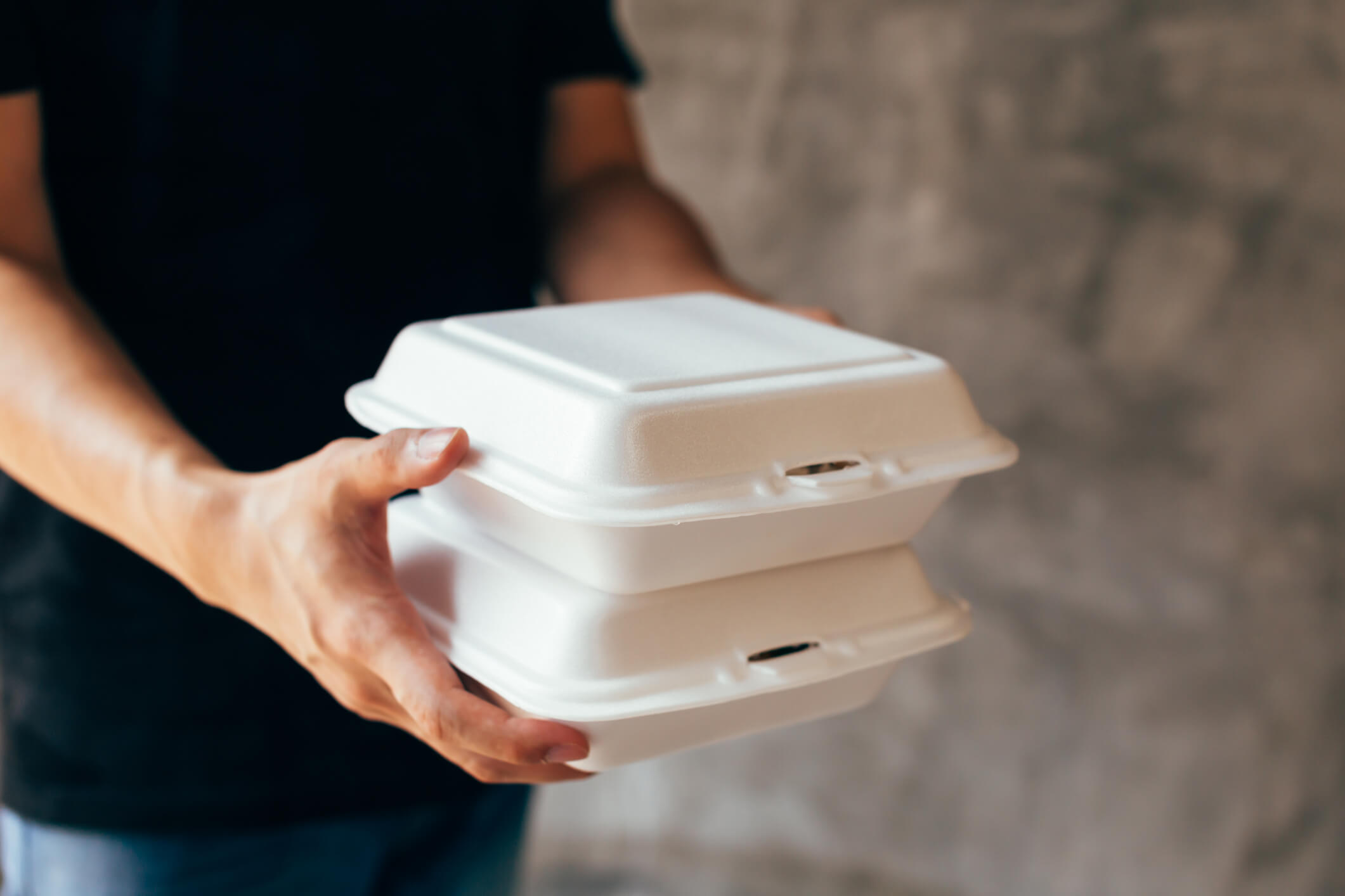 Person carrying takeout food order