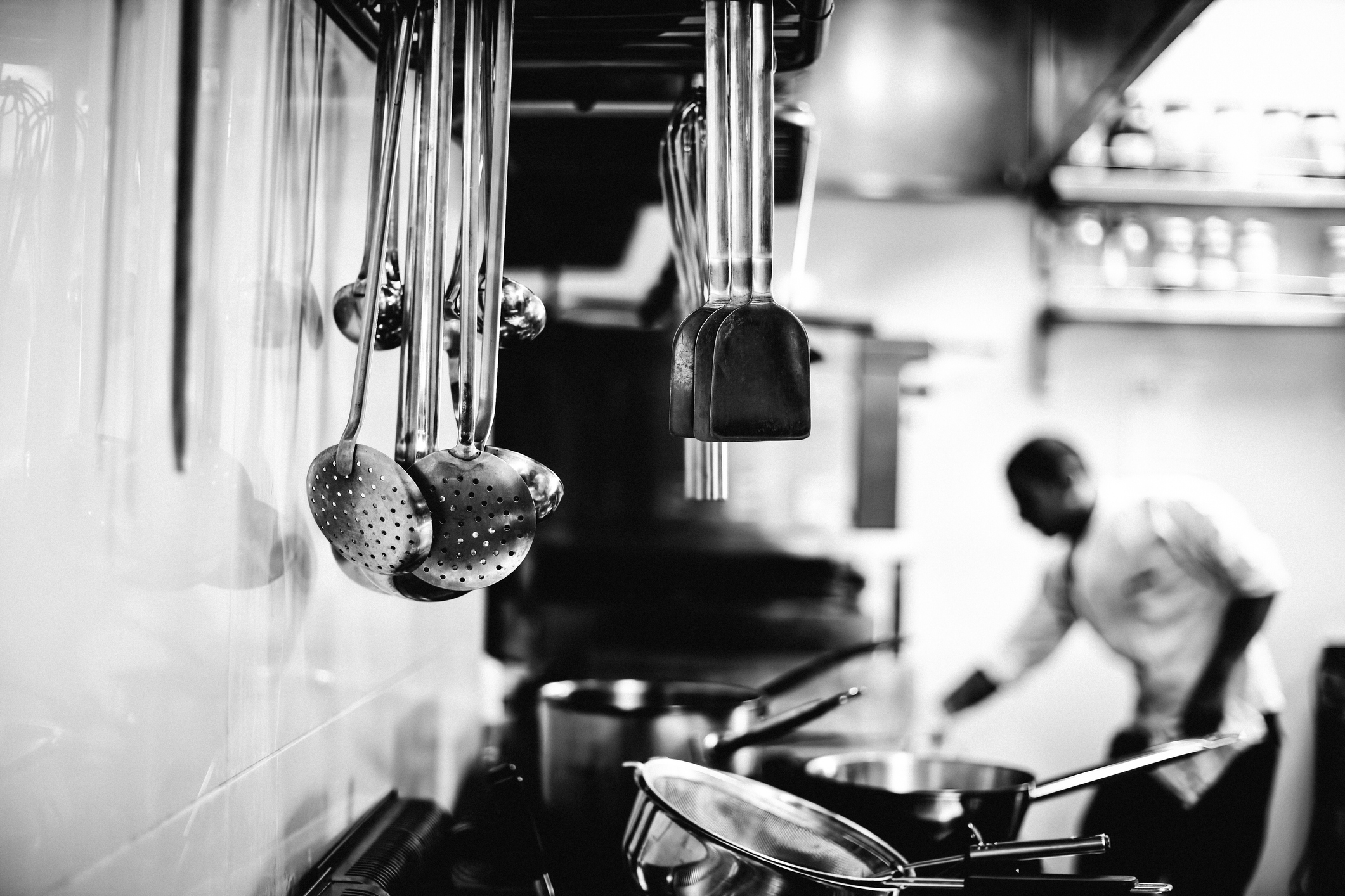 Two chefs at work in a kitchen