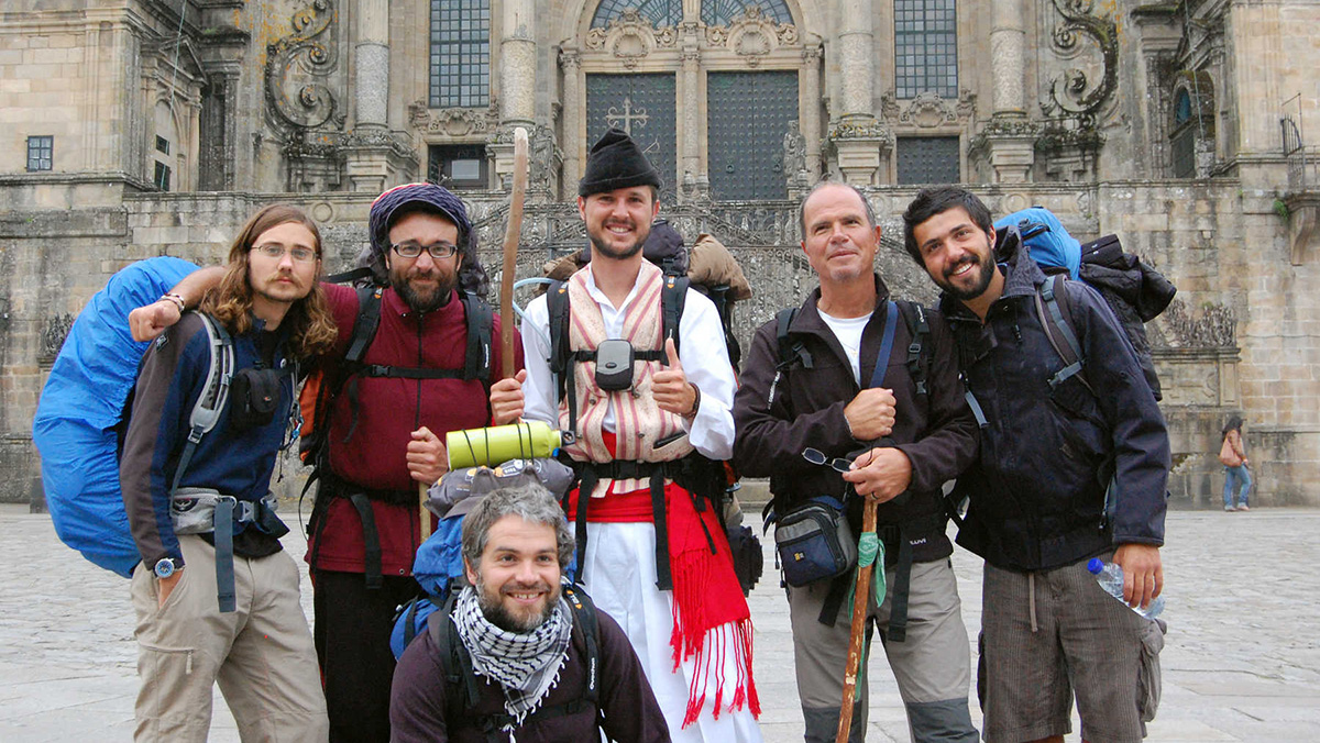 Hikers in front of the Cathedral of St James in Santiago Spain