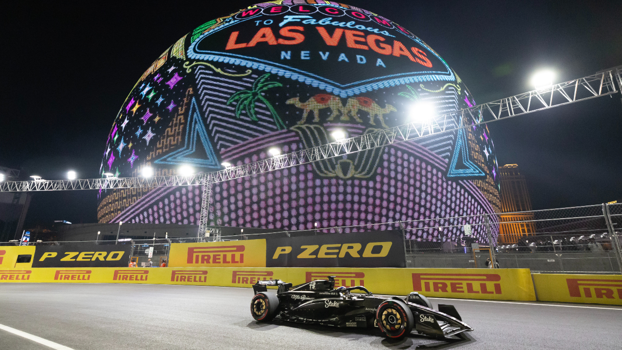 Alfa Romeo driver Valtteri Bottas passes by Sphere during practice at the Las Vegas Grand Prix