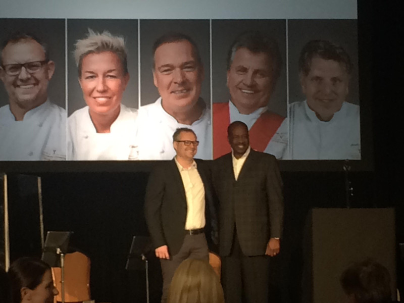Holland America Line President Orlando Ashford and new Culinary Council member Ethan Stowell shake hands at the Alaska Media 