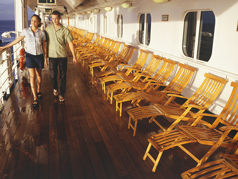 Young Couple Walking on Cruise Ship Deck