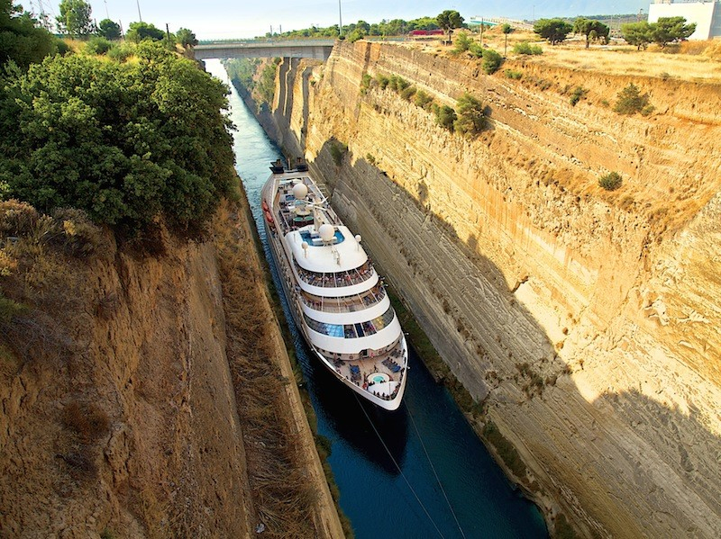 A Windstar Cruises ship passes through the Corinth Canal