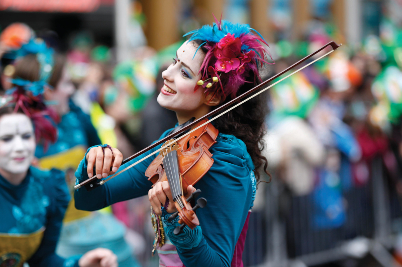 A women performs at Dublins St Patricks Day Parade