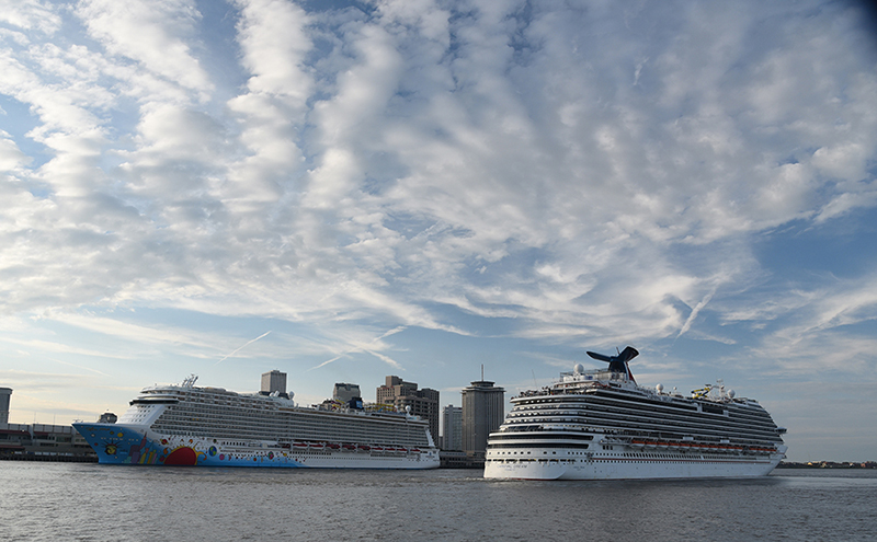 The Carnival Dream departs Port NOLAs Erato Street Cruise Terminal while the Norwegian Breakaway is berthed at the Julia 