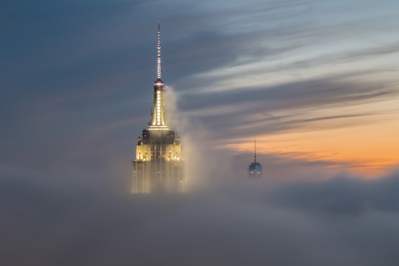 Image of one of the tallest buildings surrounded by clouds 