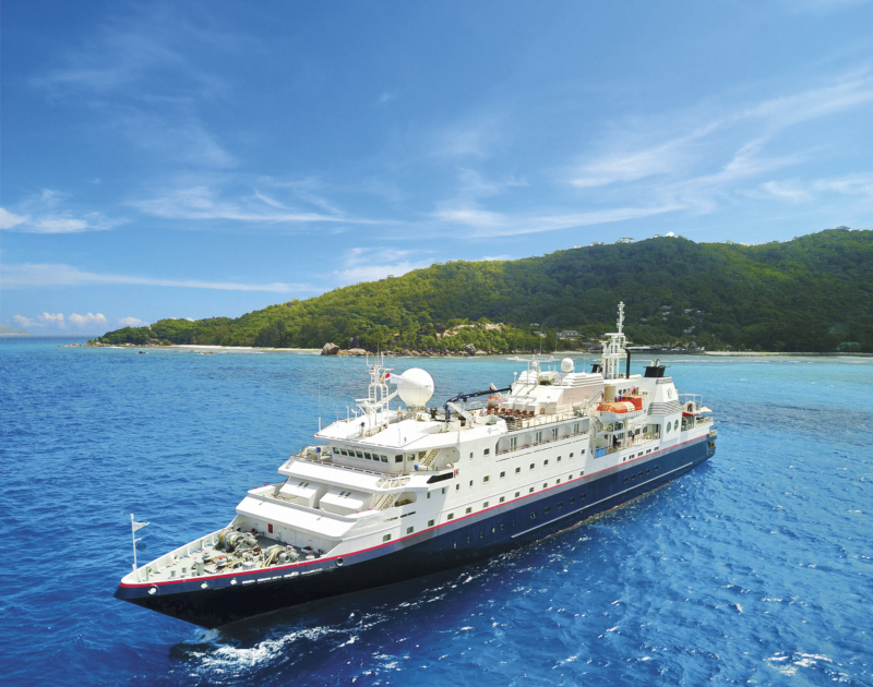 Image of cruise vessel leaving island destination 
