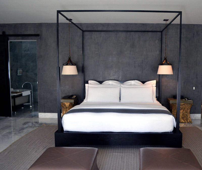 Image of contemporary bed with lamps on either side