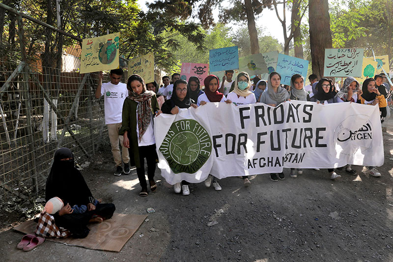 Young people attend a Climate Strike rally in Kabul Afghanistan Friday September 20