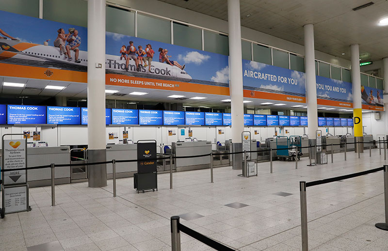 Empty Thomas Cook check-in desk in Gatwick Airport England
