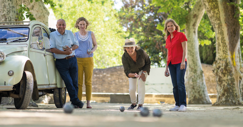 Group of people playing bocce