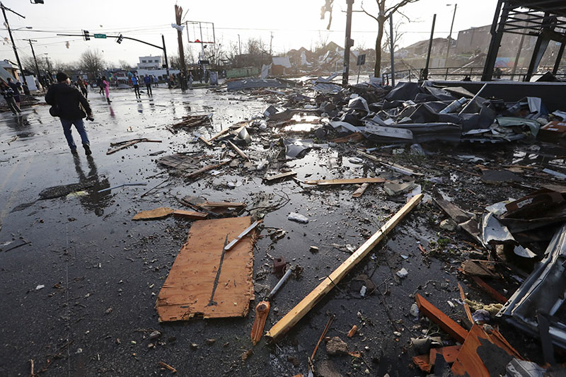 Debris covers a street after overnight storms in Nashville TN