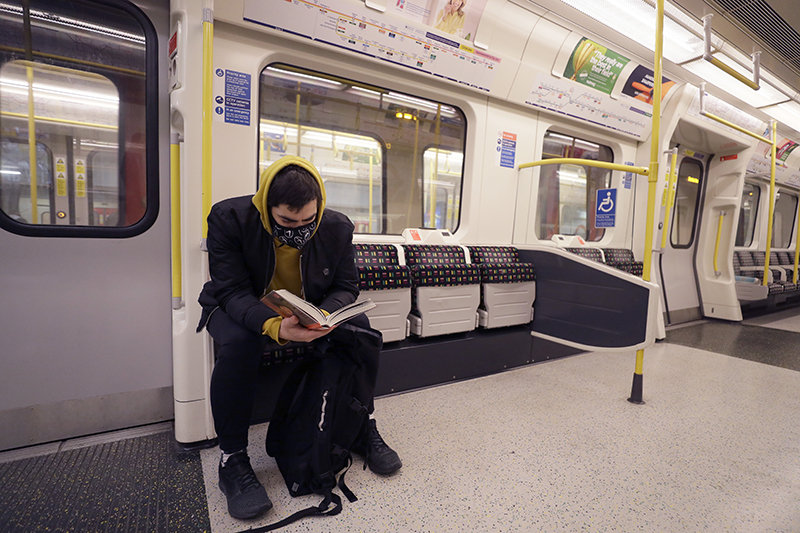 A man wearing a mask on the London Underground due to coronavirus