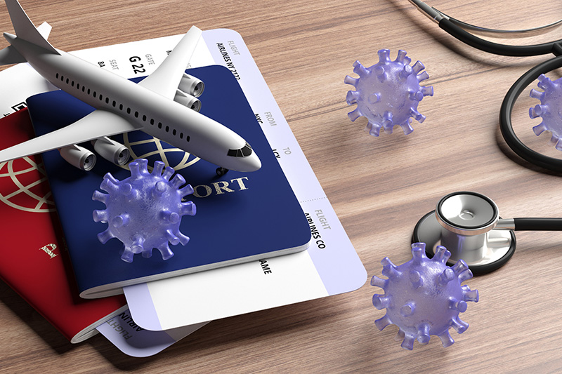 coronavirus with passport airplane and stethoscope