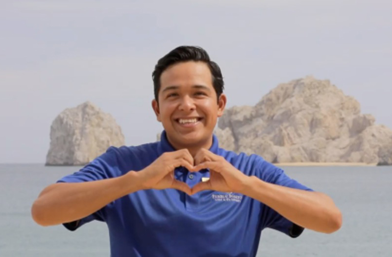 Pueblo Bonito employee making a heart with hands