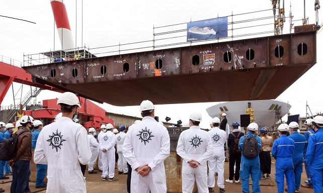 Chantiers de lAtlantique shipyard workers watch the keel laying ceremony for MSC Cruises MSC World Europa in Saint-Nazaire