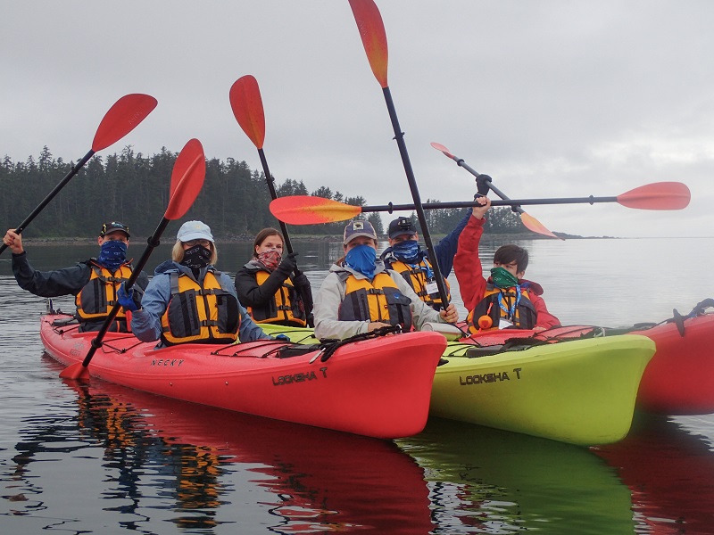 Guests on Wilderness Adventure head out kayaking during UnCruise Adventures Alaska sailin