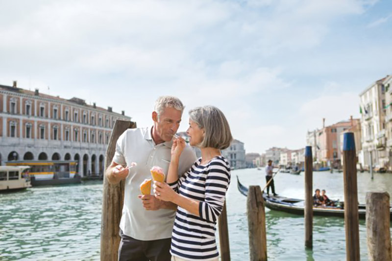 couple on a Uniworld cruise in Venice