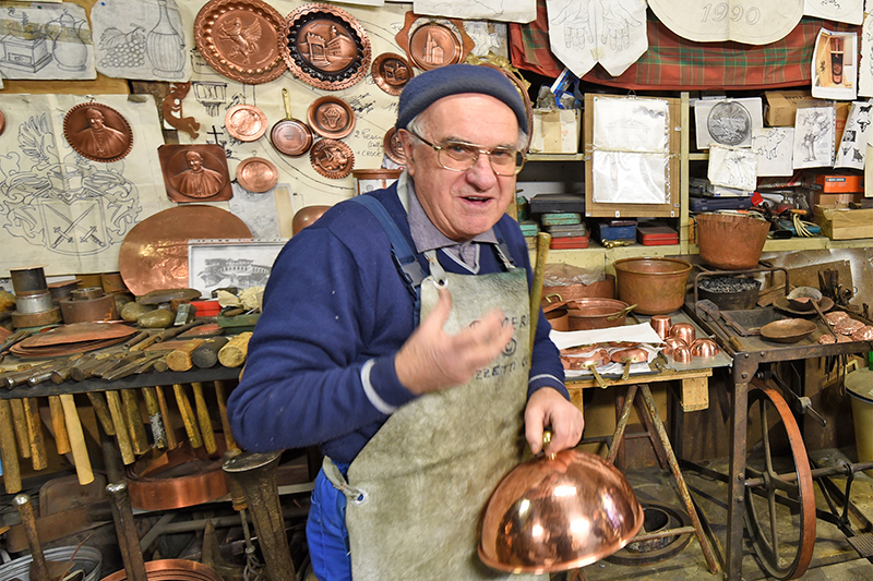 A coppersmith in Montepulciano Italy